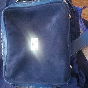 navy blye leather and suede pocketbook